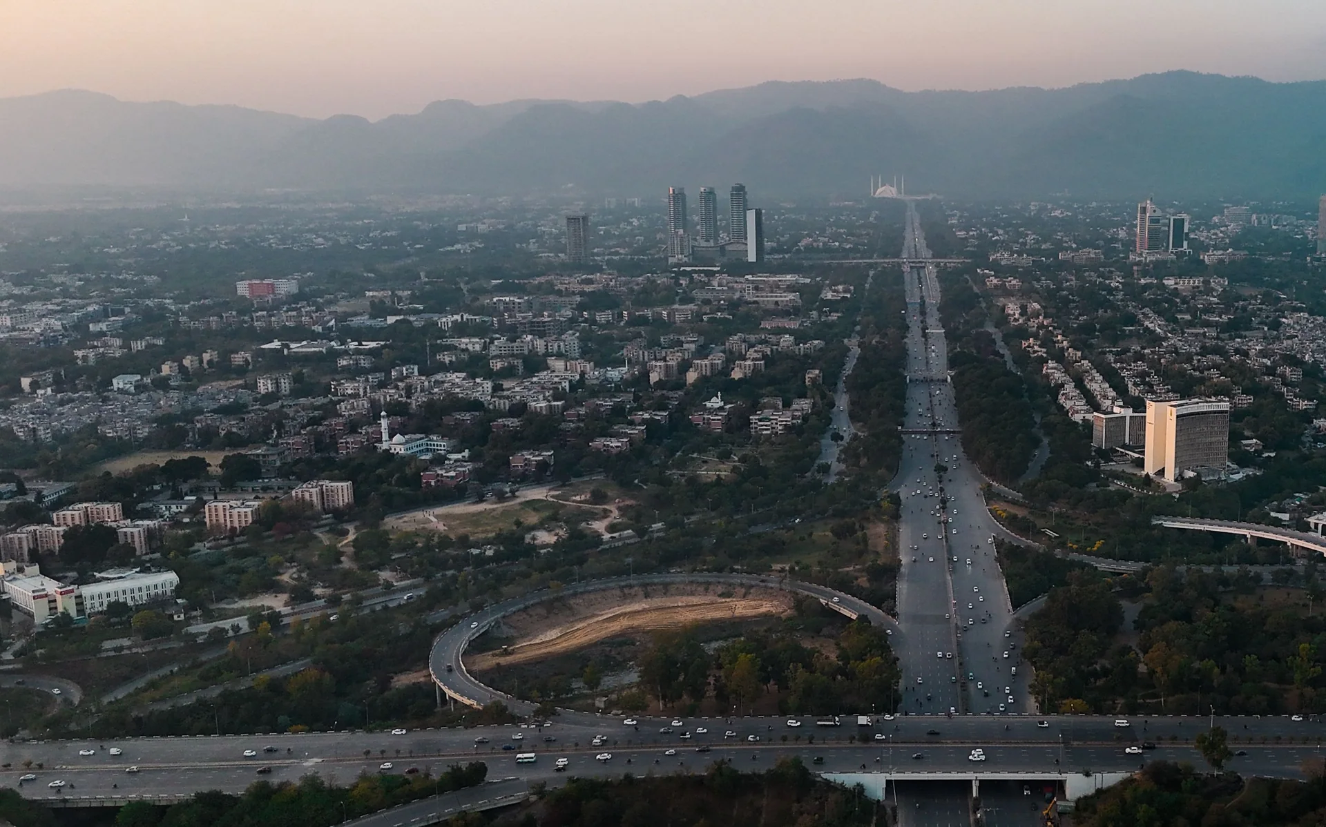 Islamabad business district high-rises against the Margalla Hills