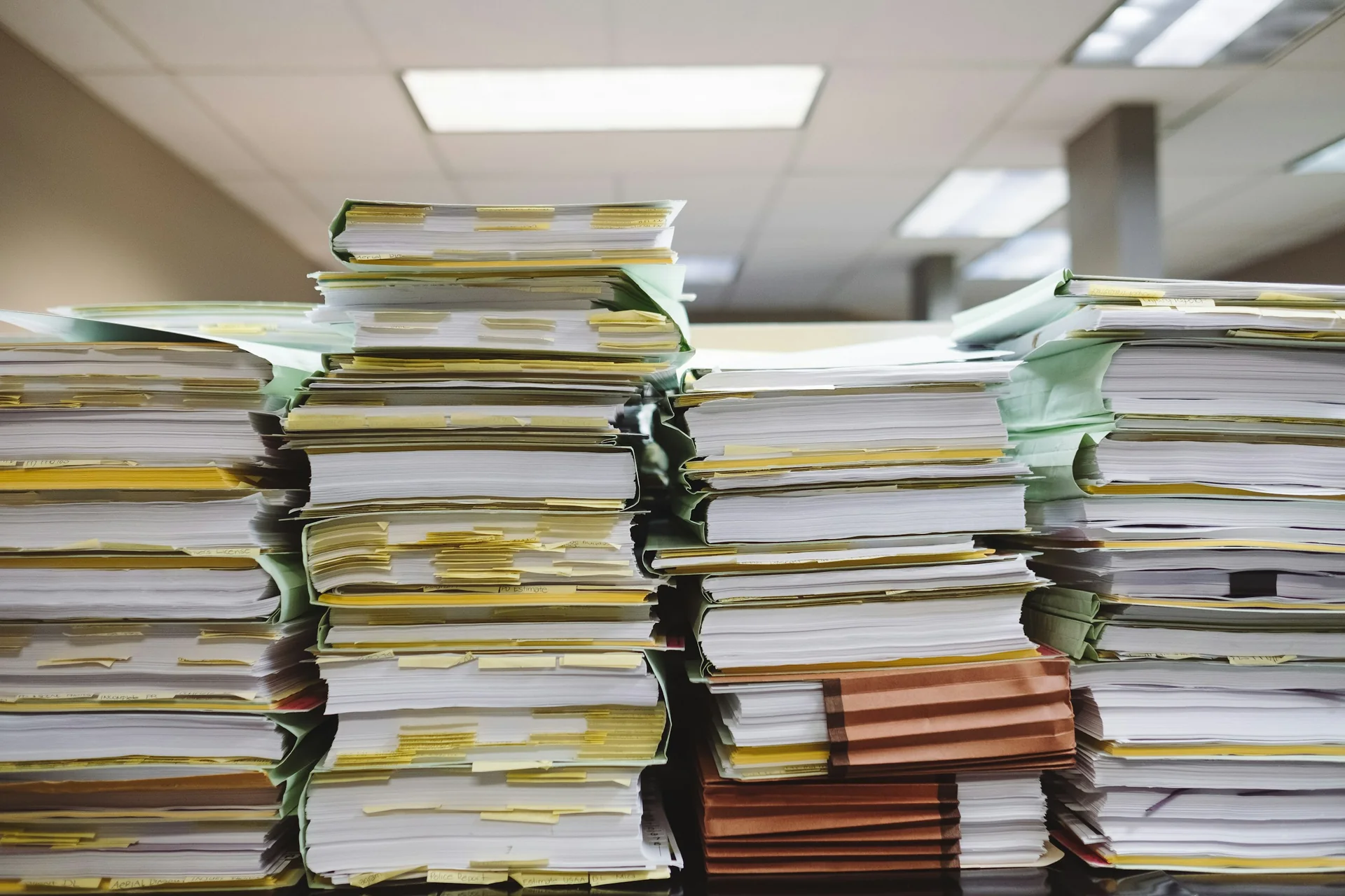 Stacks of audit files and working papers